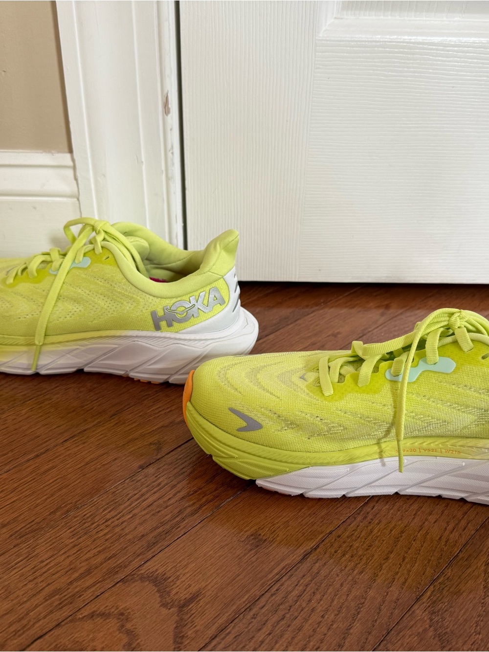 Women’s Hoka Arahi 6 Neon Yellow Athletic Running Shoes with Orange Accents - Picture 4 of 9